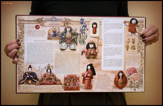 book pages with japanese dolls