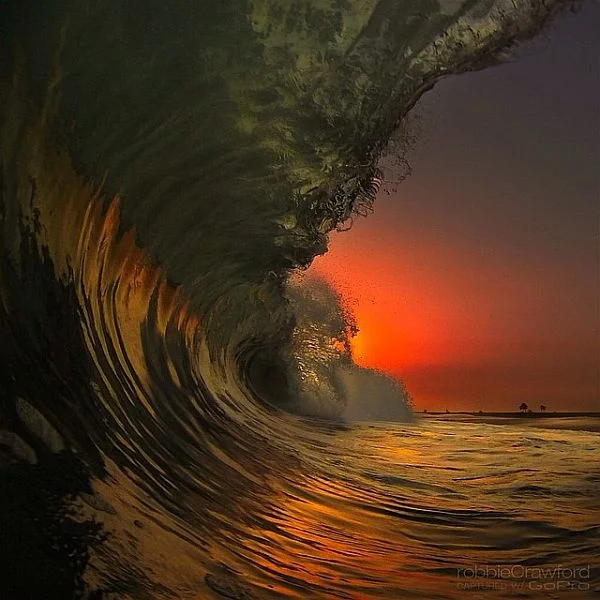 wave photo shot at sunset