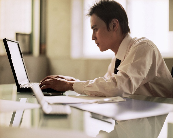 Businessman Working on Laptop