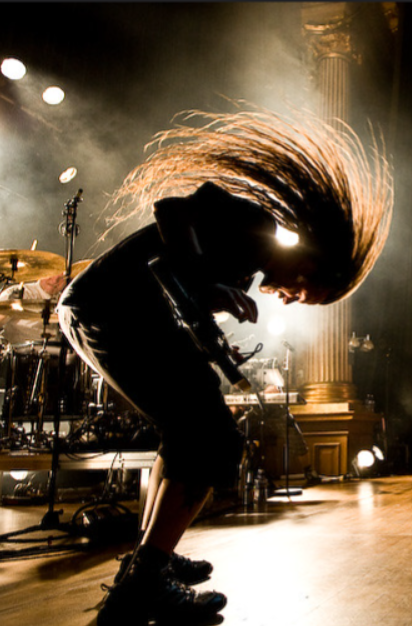 a musician headbanging
